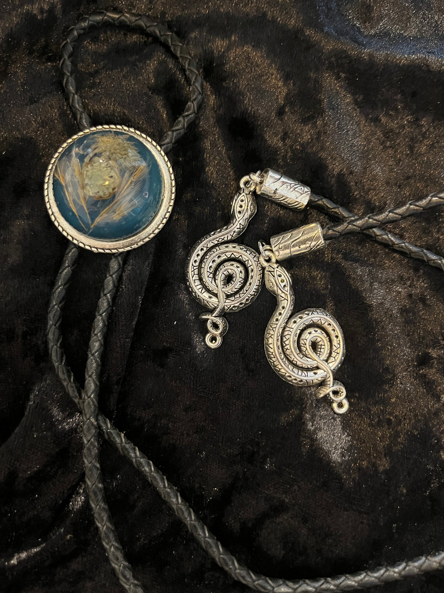 Snake charmer bolo tie