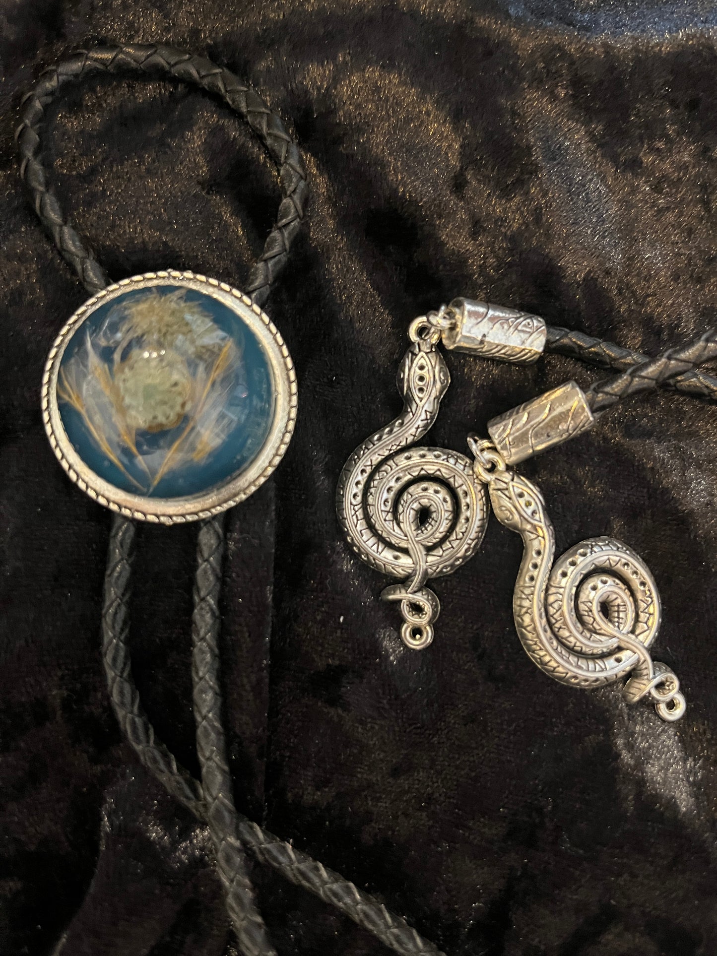 Snake charmer bolo tie